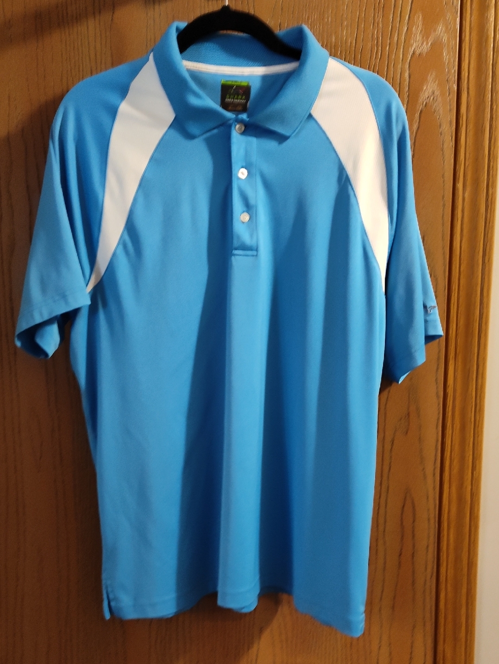 Greg Norman Men's Blue Polo with White Shoulder Panels